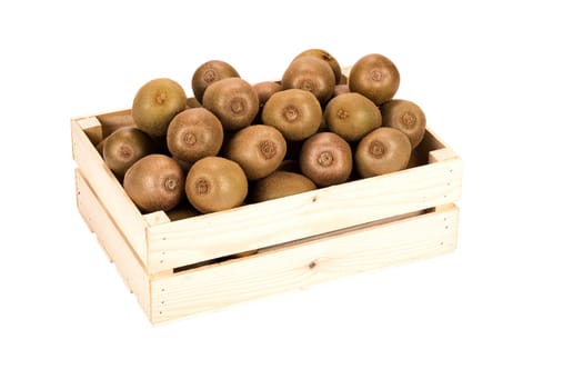 Wooden Box filled with many ripe Kiwi fruits isolated in white background