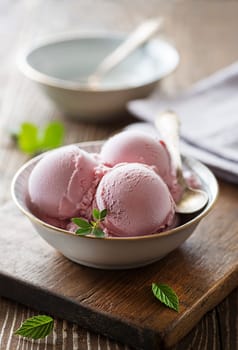 Homemade organic fruit ice cream scoops in bowl
