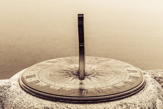 Marazion, England -  May 2018 : Old brass Sundial on the courtyard of the St Michaels Mount castle,  Cornwall, UK