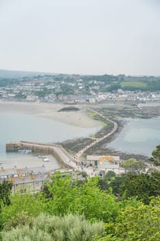 Marazion, England -  May 2018 : Aerial view of a causeway leading to the St Michaels Mount, Marazion, Cornwall