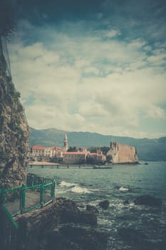 Budva, Montenegro - April 2018 : Panorama of the coastal pathway on the Budva Adriatic coast and Old Town, Montenegro