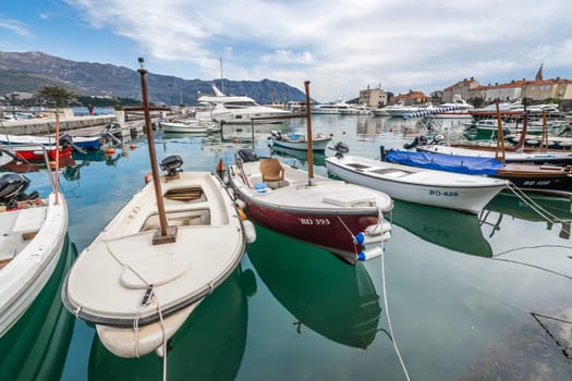 Budva, Montenegro - April 2018 : Yachts and boats moored in the port in Budva town