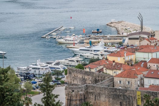 Budva, Montenegro - April 2018 : Earial view of the yachts and boats moored in the port in Budva town