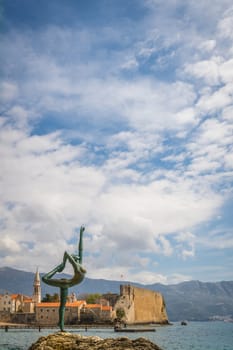 Budva, Montenegro - April 2018 :  The statue of Ballerina Dancer, standing on the rock, Budva landmark, Montenegro
