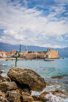 Budva, Montenegro - April 2018 :  The statue of Ballerina Dancer, standing on the rock, Budva landmark, Montenegro