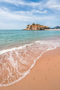 Sveti Stefan, Montenegro - April 2018 :  Beach in front of the historical old town, currently privately owned and turned into an expensive luxury hotel