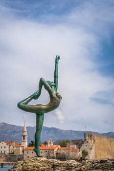 Budva, Montenegro - April 2018 :  The statue of Ballerina Dancer, standing on the rock, Budva landmark, Montenegro