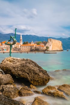 Budva, Montenegro - April 2018 :  The statue of Ballerina Dancer, standing on the rock, Budva landmark, Montenegro