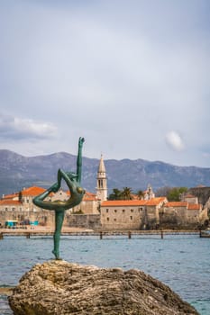 Budva, Montenegro - April 2018 :  The statue of Ballerina Dancer, standing on the rock, Budva landmark, Montenegro