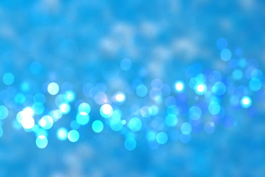 Abstract blue lightening bokeh circles from unterwater bubbles. Beautiful blue texture.