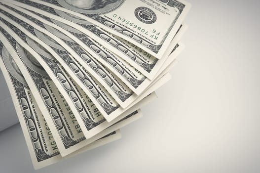 Parts of the bills of one hundred dollars are fan-side.