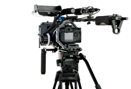 Professional video camera on the white background