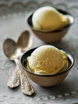 Homemade Organic Vanilla Ice Cream scoops in two bowls