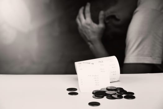 Receipt bill, money cash. Paper invoice and coins with man headache on background black and white style.