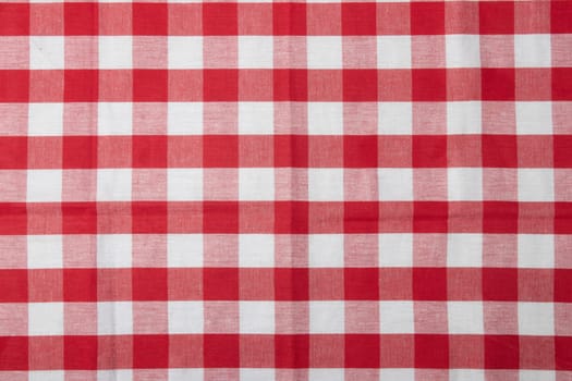 Red and white checkered napkin. Kitchen accessories.
