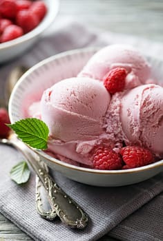 Homemade organic Raspberry ice cream scoops in bowl