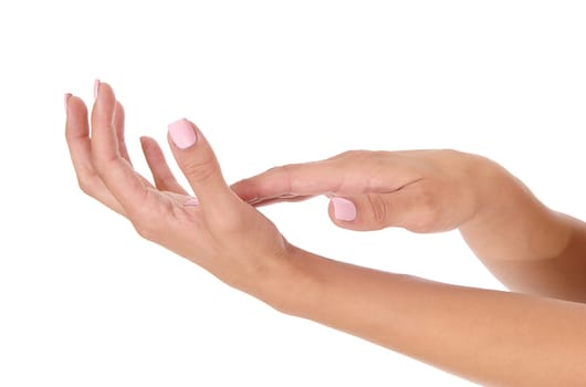 A close up of two ladies hands with polished pink finger nails, body.parts, isolated for white background.