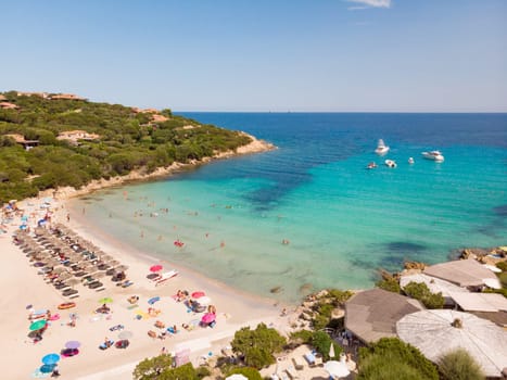 Wonderful turquoise blue colors of the sea of Cala Granu beach, bay near Porto Cervo in Costa Smeralda, Sardinia, Italy.