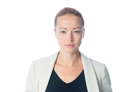 Portrait of casualy dressed,cheerful, beautiful, smart, young businesswoman in standing against white background.