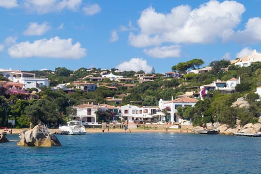 View on the beautiful village of Port Rafael from the sea, Sardinia, Italy.
