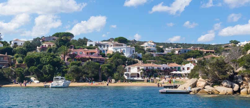 View on the beautiful village of Port Rafael from the sea, Sardinia, Italy.