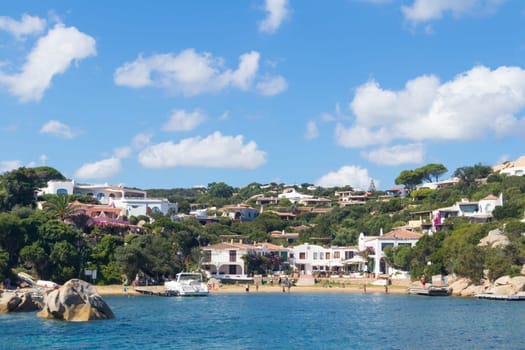 View on the beautiful village of Port Rafael from the sea, Sardinia, Italy.
