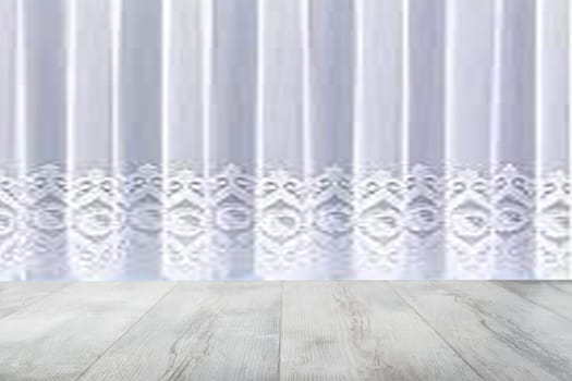 Empty rustic wooden table in front of blurred white curtain. Template for your product display montage. Space.