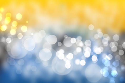 Abstract colorful gradient blue yellow bokeh lights background texture.