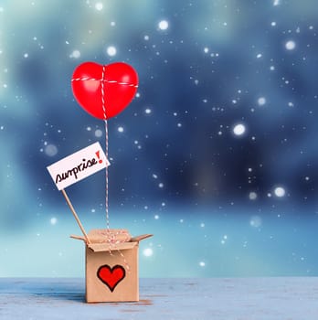 lovely gift box with red heart and surprise