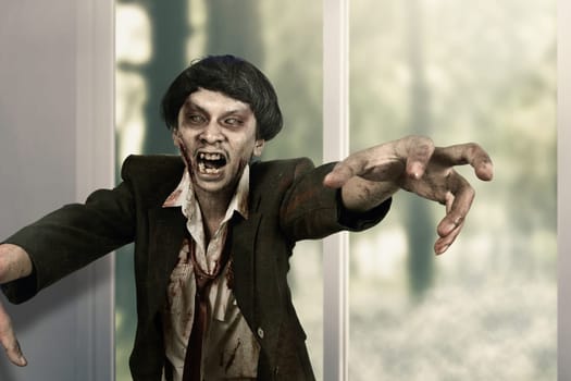 Creepy zombie man living on abandoned house. Halloween concept