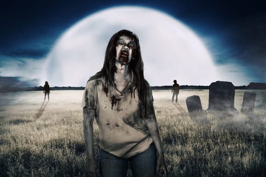 Zombies walking around on the cemetery at night