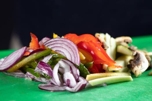 Various vegetables sliced and prepared for cooking