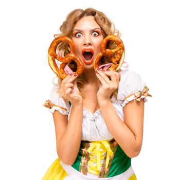 Creative concept photo of Oktoberfest waitress wearing a traditional Bavarian costume with pretzels isolated on white background.