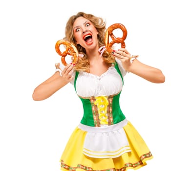 Creative concept photo of Oktoberfest waitress wearing a traditional Bavarian costume with pretzels isolated on white background.