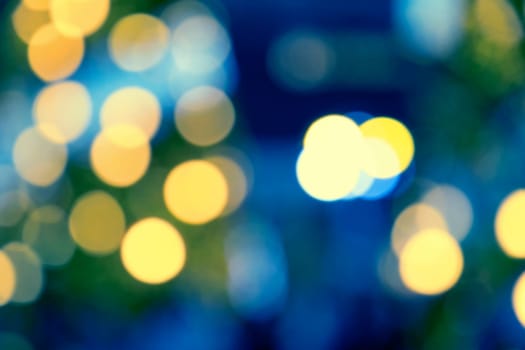 Blurry background image of defocused colorful abstract city street lights at night
