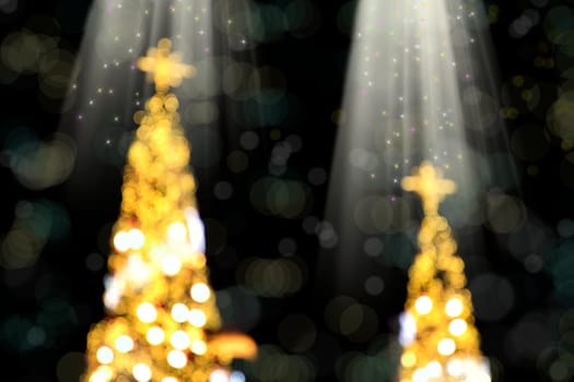 Conceptual background image of defocused abstract Christmas Tree on city street at night