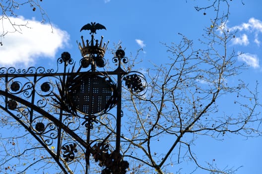 Street light with trees in downtown Barcelona, Spain