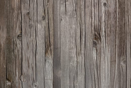 Old retro boards for use as a background. vertical planks with knots.