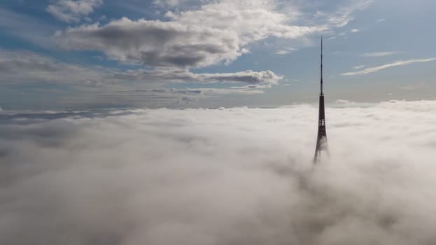 Riga Latvia Tv Tower Zakusala smoke clouds Europe biggest Aerial drone top view