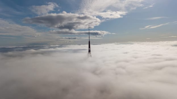 Riga Latvia Tv Tower Zakusala smoke clouds Europe biggest Aerial drone top view