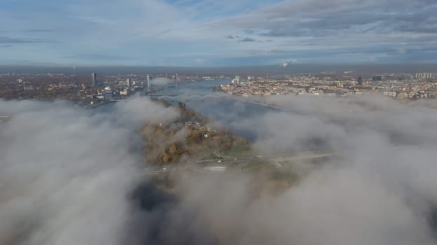 Riga Latvia Daugava river Zakusala island smoke cloud island Aerial drone top view