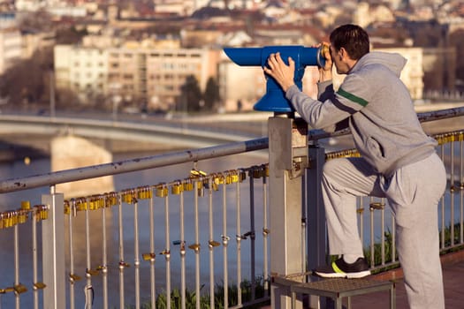 The tourist is looking the cityscape and sight of top view.