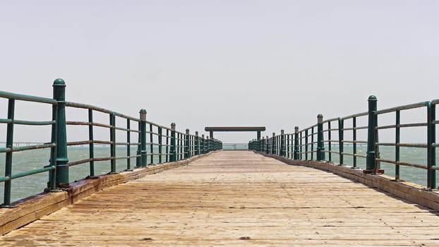 Long empty wooden pier in Kuwait