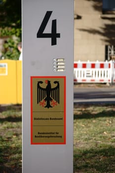 Wiesbaden, Germany - September 25, 2018: The bell switch and the entrance sign of the Federal Statistical Office, the Federal Institute for Population Research on September 25, 2018 in Wiesbaden...