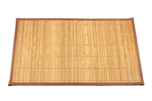 Bamboo natural dish mat for serving dishes isolated