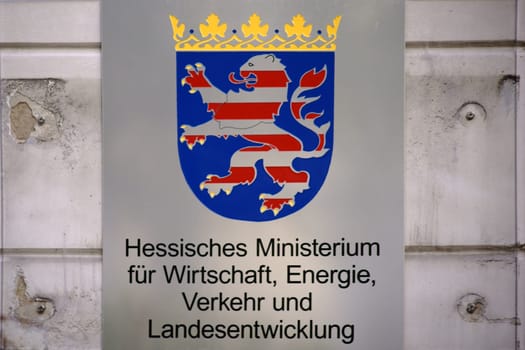 Wiesbaden, Germany - September 25, 2018: The shield and coat of arms of the Hessian Ministry of Economic Affairs, Transport and Regional Development on September 25, 2018 in Wiesbaden....