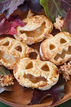 Scary puff pastry pumkpin pies for a Happy Halloween