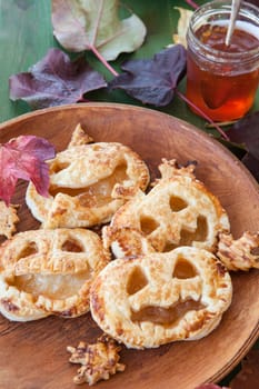 Scary puff pastry pumkpin pies for a Happy Halloween