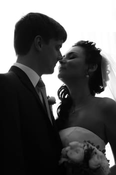 beautiful young couple stand on the balcony