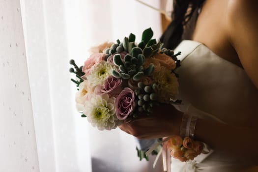 beautiful young bride stand on background forest